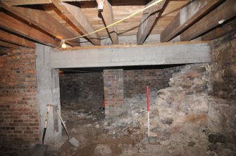 Standing building survey, Room 1/5, W-facing elevation, S end showing reduced rubble wall and
reinforced concrete lintel, 85-87 South Bridge, Edinburgh