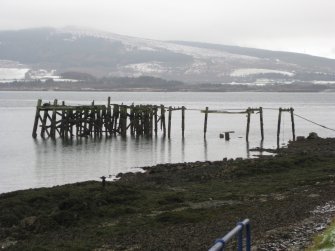 General view from south-west showing former steamer pier, Port Bannatyne, Bute.