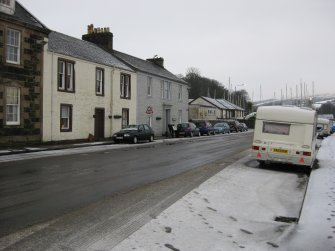 General view from east showing Nos 66-69 Marine Road, Port Bannatyne, Bute.