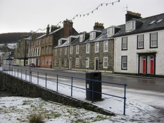 General view from north-west showing Nos 54-65 Marine Road, Port Bannatyne, Bute.