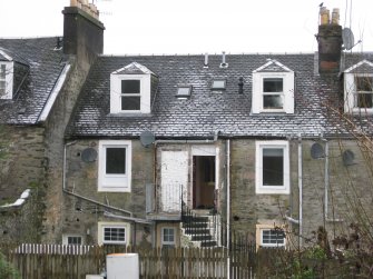 General view from south-west showing rear elevation of Nos 61, 62 and 63 Marine Road, Port Bannatyne, Bute.