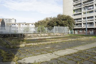 View from south-east showing former drying green at Tolbooth Wynd Estate, Leith, Edinburgh.