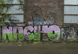 Detail of graffitti wall on southside of Dunnikier Works.