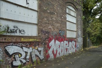 Detail of graffitti wall on southside of Dunnikier Works.