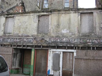 View from west showing former shop front at Nos 9-13 Watergate, Rothesay, Bute.