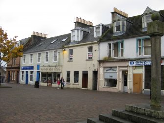 View from west showing Nos 1-8 The Square, Cumnock.