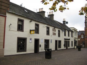 View from south-east showing The Sun Inn, No 23 The Square, and The Snug Inn, No 25 The Square, Cumnock.
