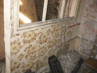 Interior view showing period wallpaper on half-glazed partition wall in 21 Queen Anne Street, Dunfermline.