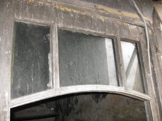 Detail of glazed fanlight above doorway at 21 Queen Anne Street, Dunfermline.