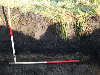 Archaeological evaluation, Trench  2 W facing section showing 003, Site 9, Borders Railway Project