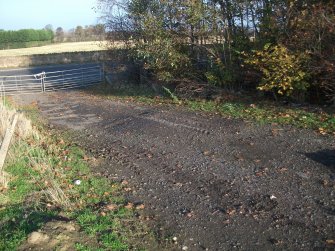 Archaeological evaluation, Entranceway looking towards road, Site 13, Borders Railway Project