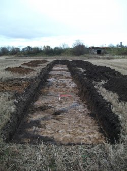 Archaeological evaluation, Trench 6 Post-Excavation with Field Drain in the foreground, Site 13, Borders Railway Project