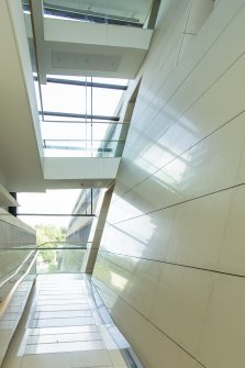 Interior view showing encased wall of No 105 Dundas Street in reception area on ground floor of No 109 Dundas Street, Edinburgh.