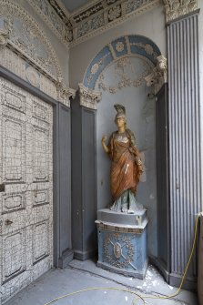 Interior view showing statue on first-floor landing at Nos 52-53 Carlton Place (Laurieston House), Glasgow.