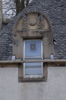 Exterior.  West facade.  Detail of dormer window.