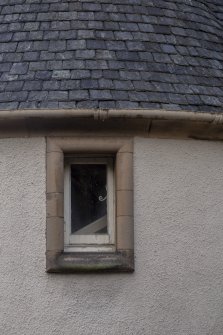 Exterior.  Detail of turret window.