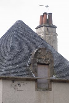 Exterior.  East facade.  Detail of dormer window.  