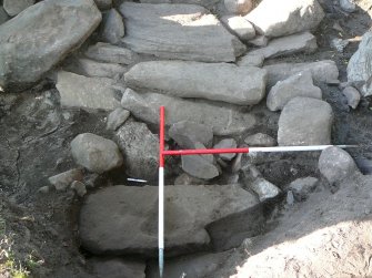 Possible lintel stones of souterrain and rubble fill of collapsed stone