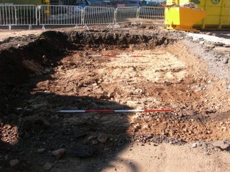 Archaeological evaluation, Trench 5, F004 removed and F005 yellow sand exposed, The Priory Hotel, Broomfield Place, Largs