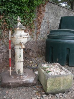 Archaeological evaluation, Salvaged fountain and stone trough from walled garden, The Priory Hotel, Broomfield Place, Largs