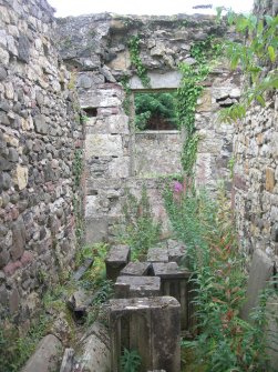 Archaeological evaluation, View through N door of stable block (into room 2), The Priory Hotel, Broomfield Place, Largs