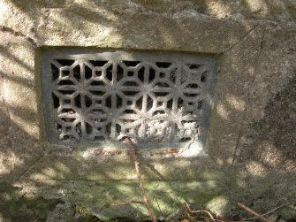 Archaeological evaluation, Stable block, room 4, S exterior elevation detail of W window lead grille ventilation cover, The Priory Hotel, Broomfield Place, Largs