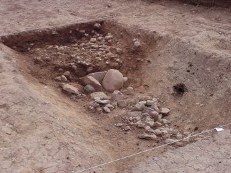 Excavation, Outer ditch stony fills and FD, Whittingehame Tower, Traprain Law Environs project Phase 2, East Lothian