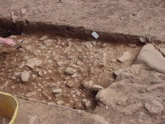 Excavation, Section down to cobbles, Whittingehame Tower, Traprain Law Environs project Phase 2, East Lothian
