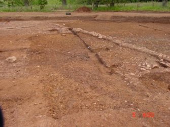 Excavation, General view of cobbles removed, Whittingehame Tower, Traprain Law Environs project Phase 2, East Lothian