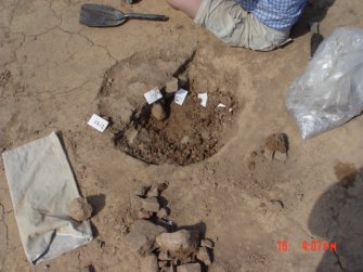 Archaeological excavation, Day 6, F56 Neolithic pit, Standingstone, Traprain Law Environs Project Phase 2, East Lothian