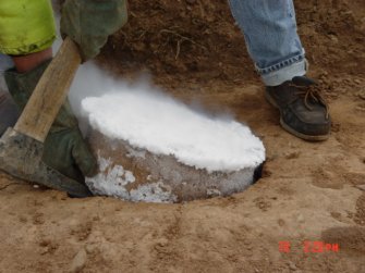 Archaeological excavation, Lifting the cremation, Standingstone, Traprain Law Environs Project Phase 2, East Lothian