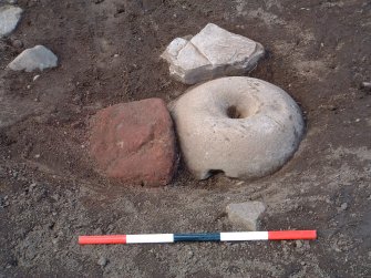 Archaeological excavation, W ditch quern, Knowes Farm, Traprain Law Environs Project Phase 2, East Lothian