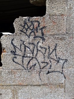 View of graffiti on the external face of the WSW end-wall.