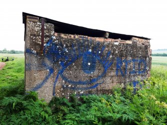 View of graffiti on the external face of the ENE end-wall.