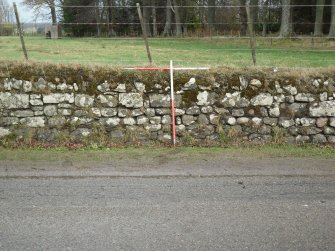 Archaeological evaluation, View of typical section Knockbreck House E wall, ASDA Store, Tain