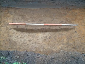 Archaeological evaluation, Trench 4, NE facing section through pit, East Beechwood Farm, Highland