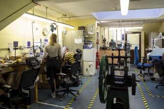 Interior. Third floor. General view of goldsmiths workshop, lined with traditional goldsmith benches.