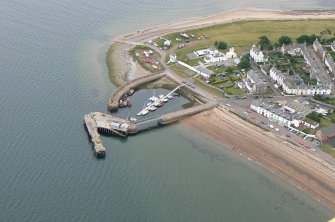 Oblique aerial view of Cromarty harbour and N end of burgh, looking E.
