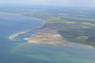 Aerial view of Ardersier, site of former oil rig construction yard, E of Inverness, looking E.