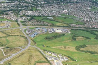 Aerial view of Castle Heather Golf Course and Driving Range, E of Inverness, looking N.