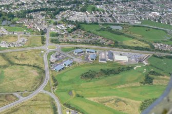 Aerial view of Castle Heather Golf Course and Driving Range, E of Inverness, looking N.