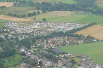 Beauly, oblique aerial view of S end of village, looking SW.