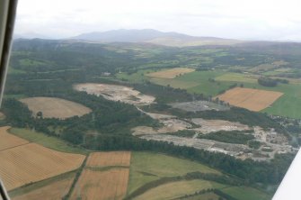 Aerial view of Balblair Quarry and Electricity Substation, near Beauly, oblique view, looking W.