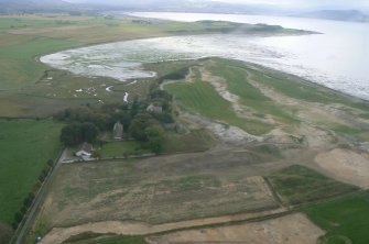 Aerial view of Castle Stuart Golf Course under construction, E of Inverness, looking W.