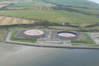 Aerial view of Oil Storage tanks at Nigg, Cromarty Firth, looking E.