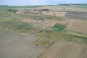 Aerial view of former WW2 camp on edge of Fearn RNAS Airfield, Tarbat Ness, looking E.