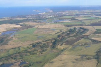 Aerial view of area between Easter Lochend and Nairn, looking E.