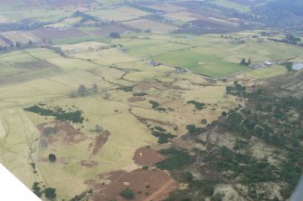 Oblique low angle aerial view over the Heights of Keppoch, near Dingwall, looking SW.