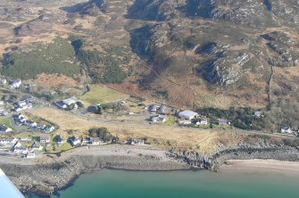 Close up aerial view of Gairloch at junction of A832/B8021, looking E.
