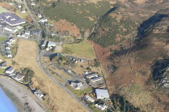 Close up aerial view of Gairloch at junction of A832/B8021, looking NW.